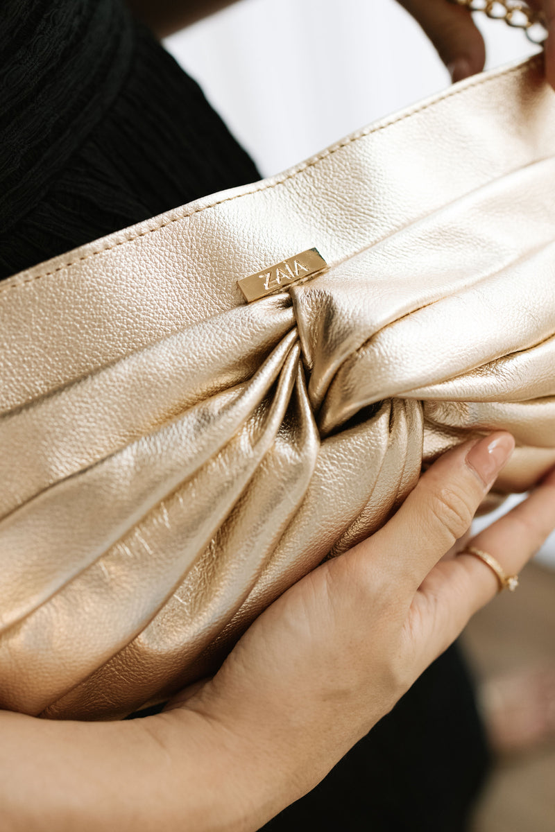Bolsa feminina de couro dourado Sarah